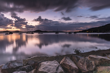 First Light with Heavy Rain Clouds on the Bay