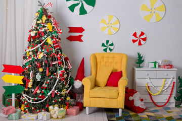 Beautiful Christmas interior with Christmas tree and gifts. New year decoration. Christmas background, concept.