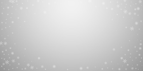 Sparse glowing snow Christmas background. Subtle f