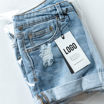 Ripped Jean Shorts With A Tag Mockup