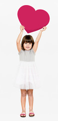 Happy girl holding a heart icon