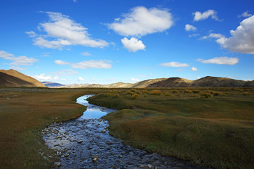 Veiw of Amazing summer landscape with Altai Mountains and winding river in Autumn of Western Mongolia