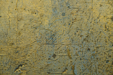 Obraz premium Abstract Grunge Pattina effect Pastel Gold Retro Texture. Decorative wall paint. Blue and golden messy wall stucco texture background
