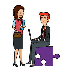 business couple sitting in puzzle piece with laptop