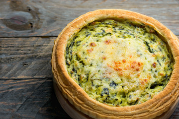 Homemade puff pastry quiche lorraine with leeks swiss gruyere and soft goat cheese with scrumptious...