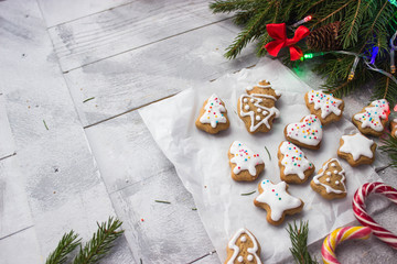 gingerdread christmas cookies and decorations on wooden table free space for text - holidays, winter, celebration,  Christmas and  new year concept