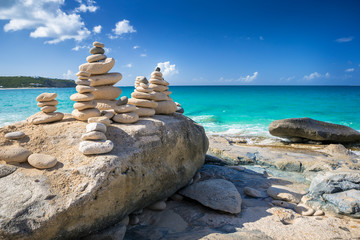 Stacks of stones in balance at a beach
