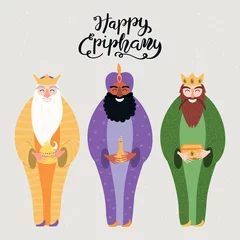 Poster Hand drawn vector illustration of three kings of orient with gifts, lettering quote Happy Epiphany. Isolated objects on gray background. Flat style design. Concept, element for card, banner. © Maria Skrigan