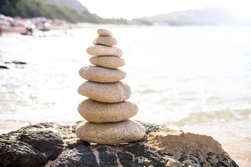 Fototapeta na wymiar Stack of stones in balance at a beach