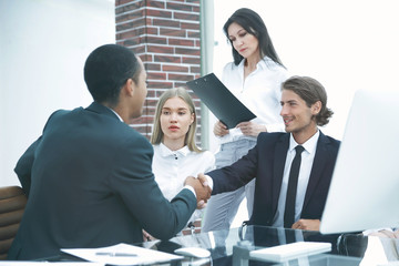 Business Partner Shake Hands on meetinig in modern office building