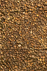 Background from a covering of a park path from sea stones