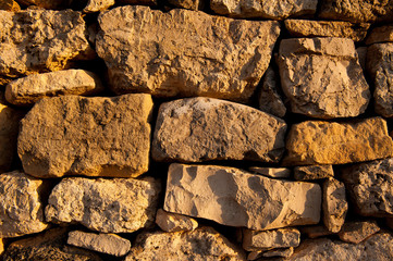 old stone wall of stones