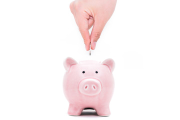 Savings tanks, steel shovels and hands in the white background