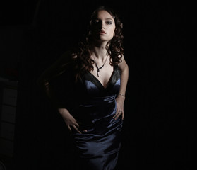 Naklejka premium portrait of beautiful woman in evening dress