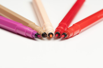 Colored markers isolated on white background