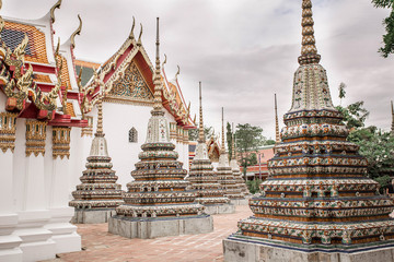 Panorama view of Ancient Stupas and pagoda in Wat Pho temple in Bangkok, Thailand. Famous landmark...