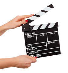 Cinema clapboard in hands isolated on white background