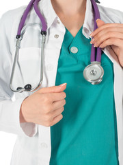 Close-up of female doctor using stethoscope. Isolated on white
