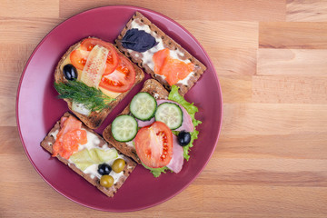 toasts with healthy vegetables for breakfast lying on a plate