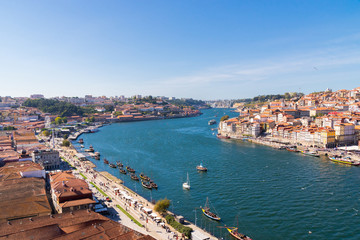 Naklejka na ściany i meble Porto, Portugal old town ribeira aerial promenade view with colorful houses, Douro river, panoramic view