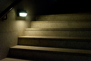 Illuminated stairs in the building. Suspense background.
