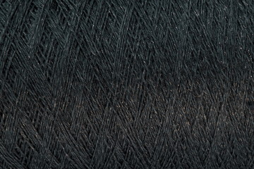 Angora and merino mix wool . yarn dark gray color background