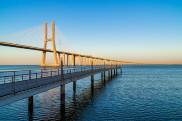 Fototapeta na wymiar The Vasco da Gama Bridge in Lisbon, Portugal. It is the longest bridge in Europe