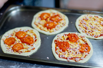 different kinds of pastry are being cooked