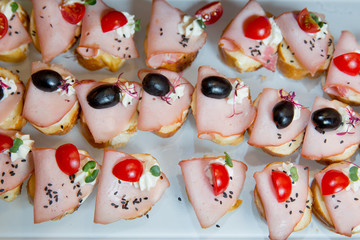 different types of catering canapes on buffet