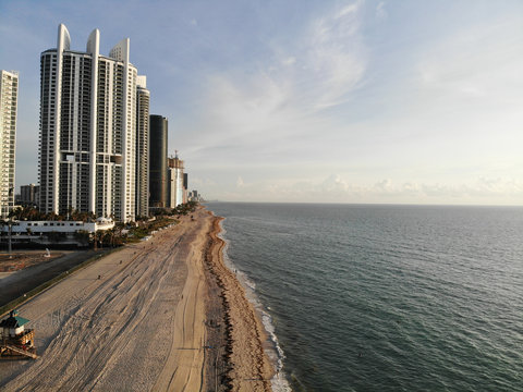 Aerial Drone shot above Sunny Isles Beach at time of sunrise, Florida