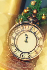 Fototapeta na wymiar Composition with retro alarm clock and Christmas decoration