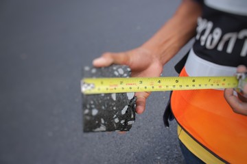 To measure the thickness of the paved surface