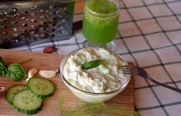 Tzatziki sauce ingredients cucumber garlic. Healthy organic food.