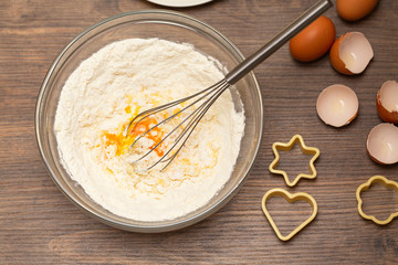 Preparation of the cookies. Flour with egg and ingredients