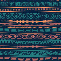 Seamless ethnic pattern. Tribal ornament. Striped geometric background drawing by hand. Vector illustration.