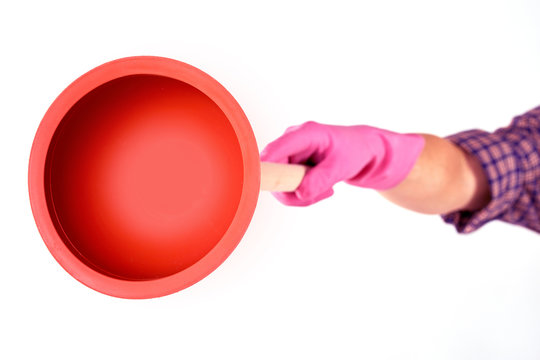 Unidentifiable person showing red rubber plunger