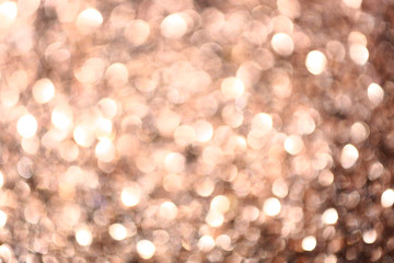 Blurred golden glitters, closeup