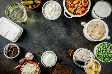 Super Healthy Probiotic Fermented Food Sources, drinks, ingredients, on dark concrete background copy space top view