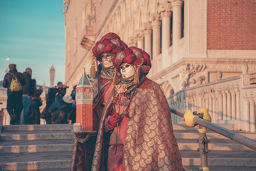 Colorful carnival masks at a traditional festival in Venice, Italy