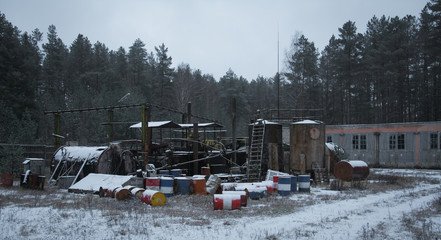 old abandoned oil barrels