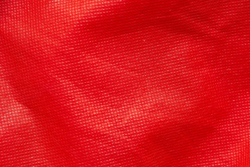 Red non woven fabric texture background