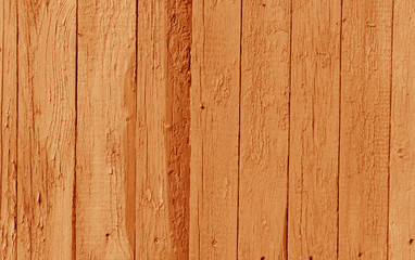 Fototapeta na wymiar Old wooden wall in orange color.