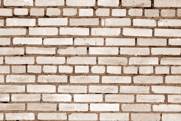 Old grungy brick wall surface in brown tone.
