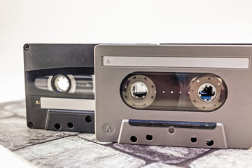 Audio cassettes on different background