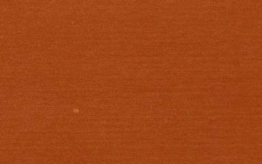 Fototapeta premium Old grungy canvas pattern with dirty spot in orange color.
