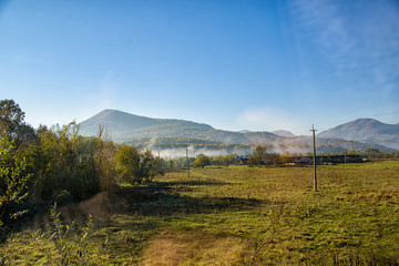 Beautiful mountain landscape with rocks and fog