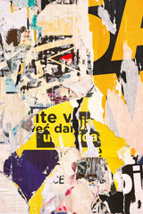 Old grunge ripped torn vintage collage posters creased crumpled paper surface placard texture background backdrop