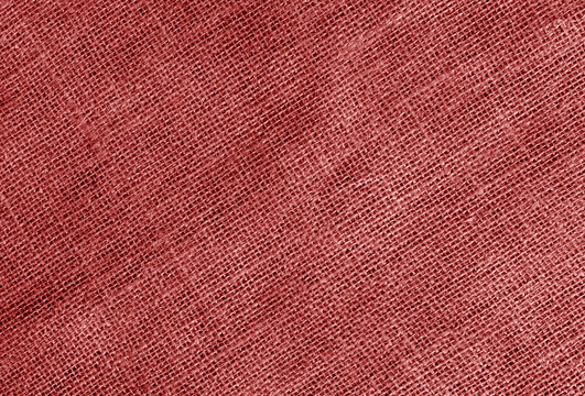 Linen cloth texture in red color.