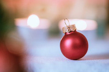 Red Christmas balls with decoration on shiny background