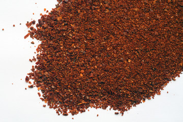 Red paprika on white background.